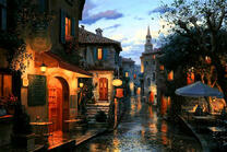 Кафе на вечерней улице после дождя